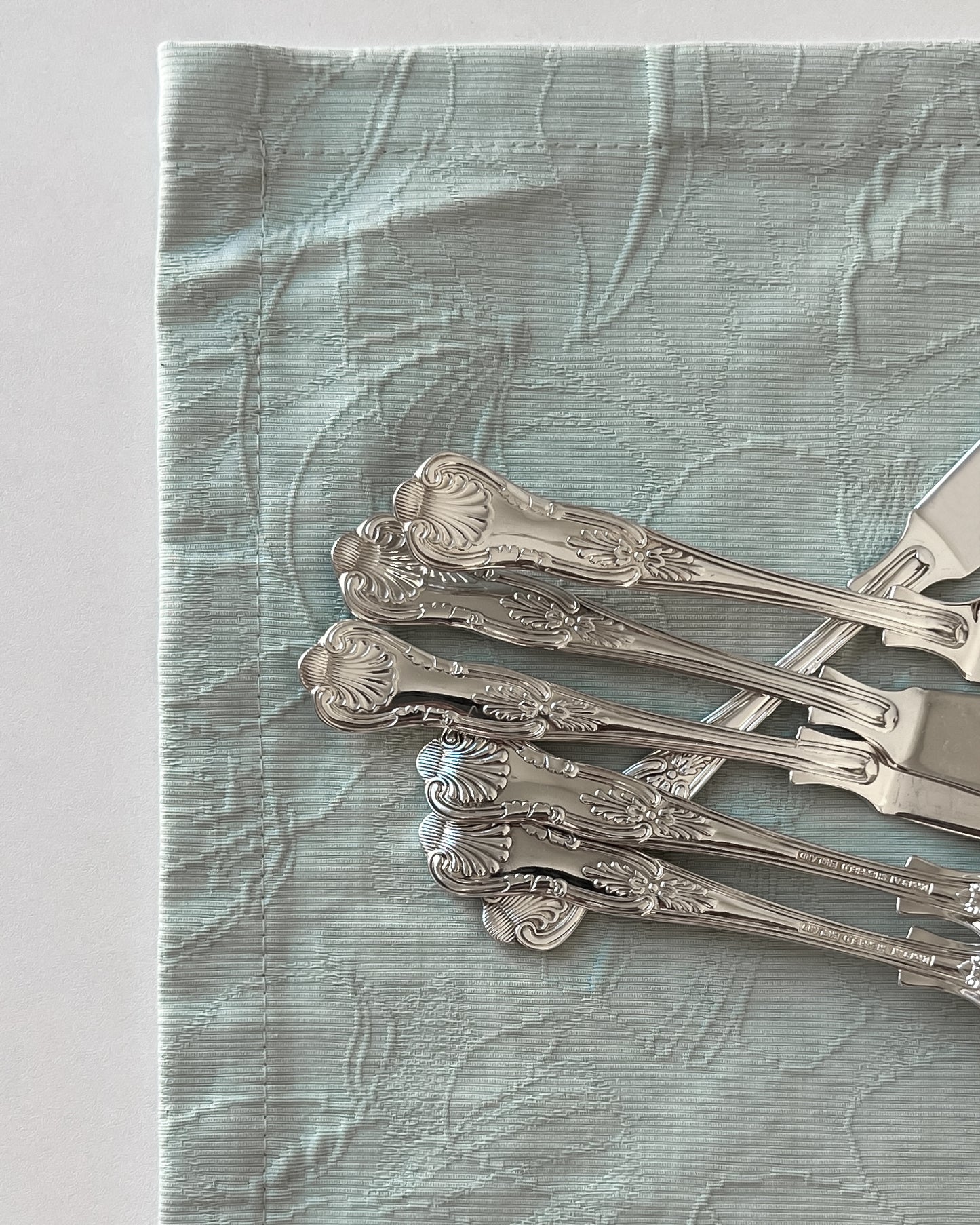 The Sheffield silver-plated knife presented as a distinguished caviar server, perfect for a luxurious tablescape.