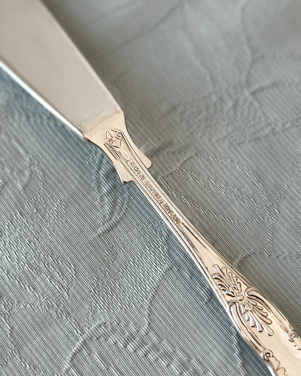 The authentic EPNS A1 Sheffield England engraving on the underside of the knife, signifying a superior grade of English silver plating.