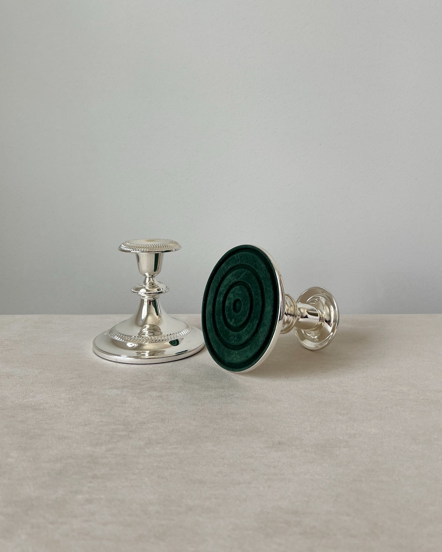 Close-up of a German silver-plated candlestick, showcasing the beautifully adorned details and exceptional vintage quality of the mid-century design.