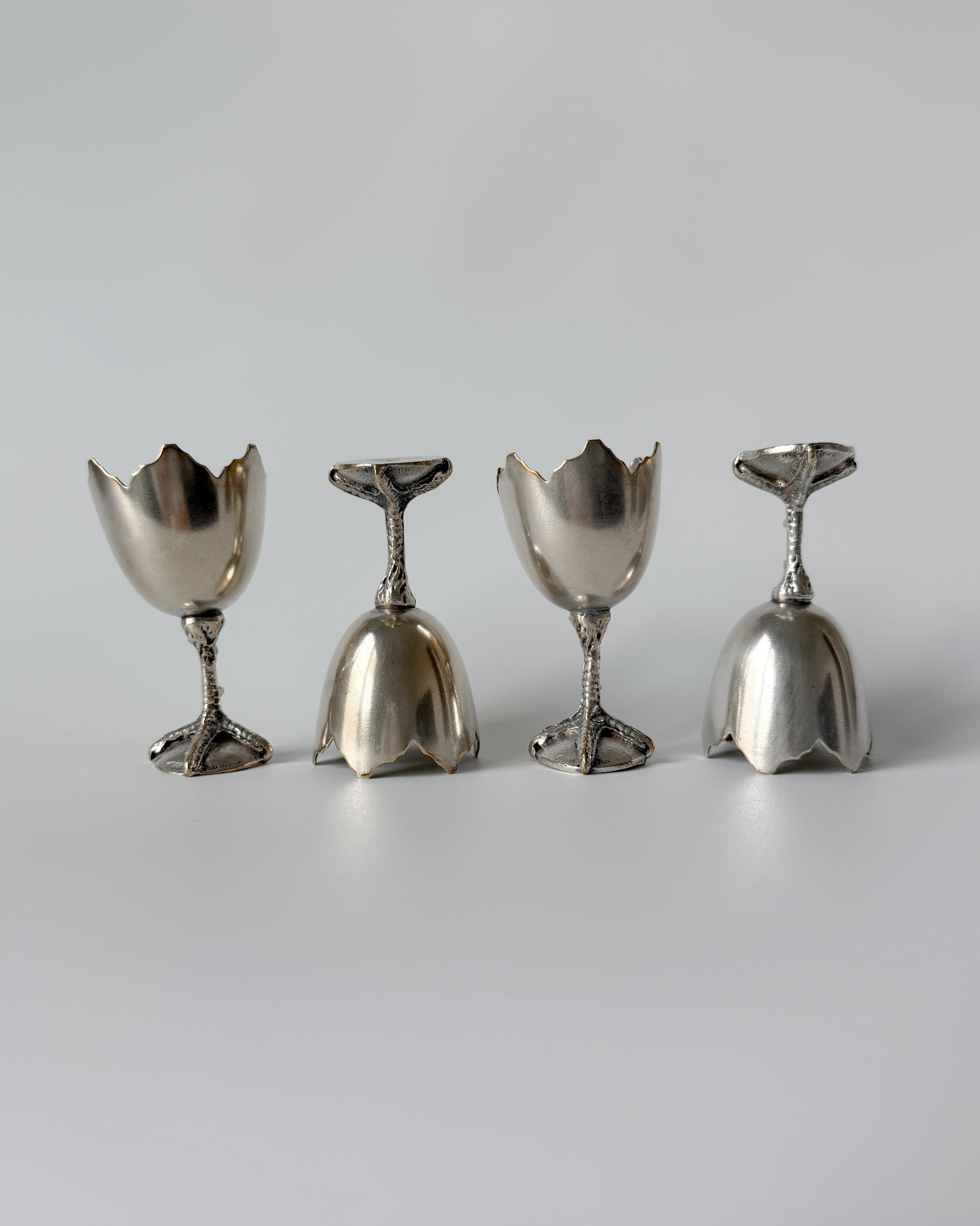 Top view of the egg cup bowl designed to look like a jagged broken eggshell, a classic example of whimsical 1950s surrealist tableware.
