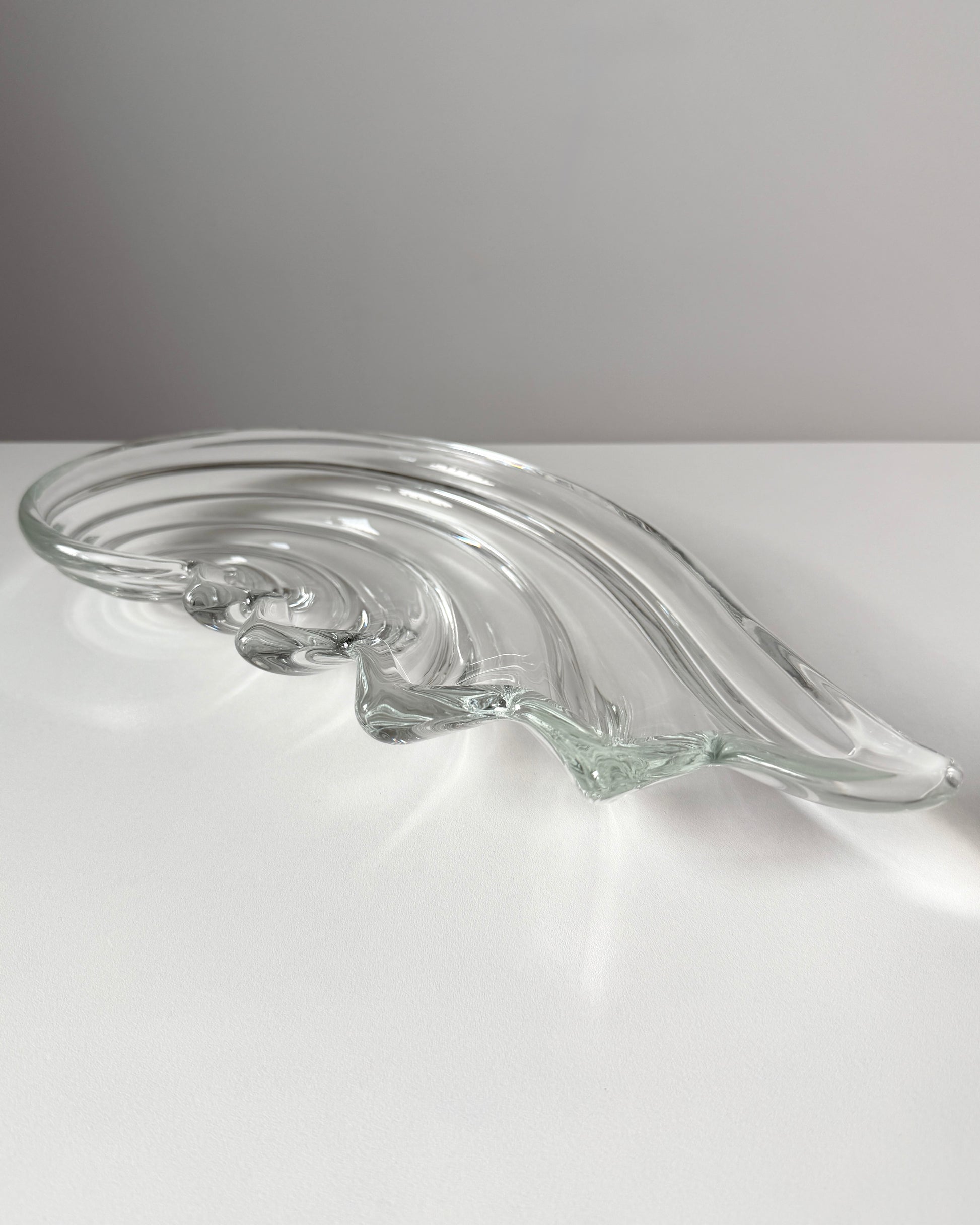 Macro detail of the glass edge, showing how the thick crystal refracts light beautifully, a testament to the quality of vintage German glassmaking.