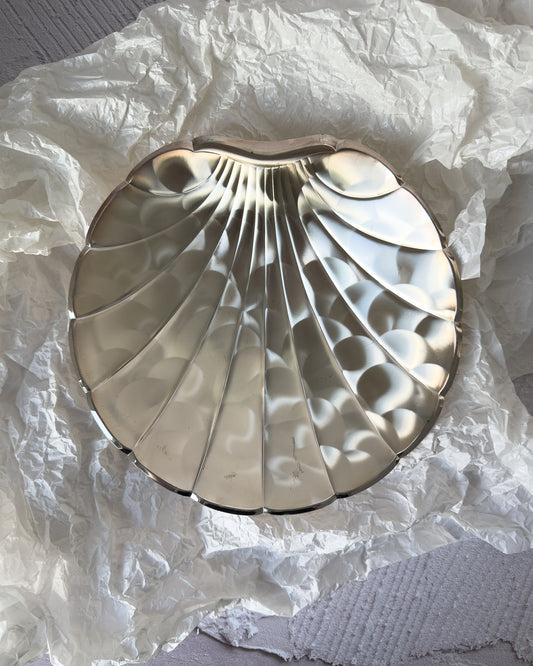 A large vintage BMF silver-plated ikora shell centerpiece from West Germany, featuring a dramatic scallop silhouette and high-polish mirror finish.